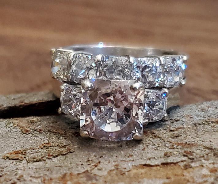 Wedding Style Sterling Silver Ring Set Sz 6: Please see pics for details as this is the exact item you will receive.Ã‚ These rings are soldered together as one.Ã‚ Size: 6 Center measures appx 10mm at widest both bands Weight in Grams: 6.75