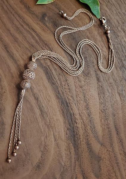 Italy Gold over Sterling Silver Lariat Tassel Necklace: Please review the pictures closely as this is the exact item you will receiveÃ‚ Length: 18 Inches Weight in Grams: 13.56 Hallmarks and Stamps: 925, Italy Please note: All items are taken at stamped