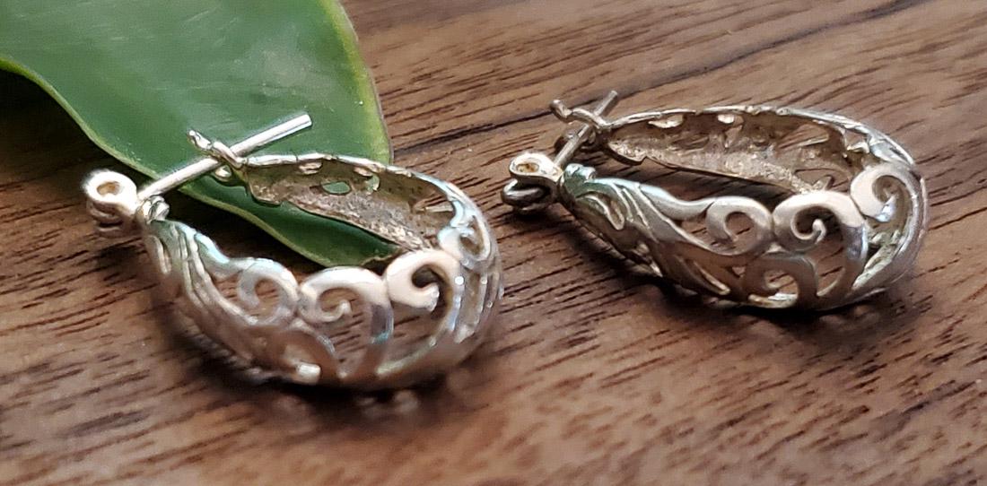 Sterling Silver Scroll Hoop Earrings: Length or Drop: 20.9 mm Width: 6.7 mm Weight in Grams: 2.33 Hallmarks and Stamps: 925, Unknown Makers mark Please Note: All items are taken at stamped value and are not tested unless stated. As with a