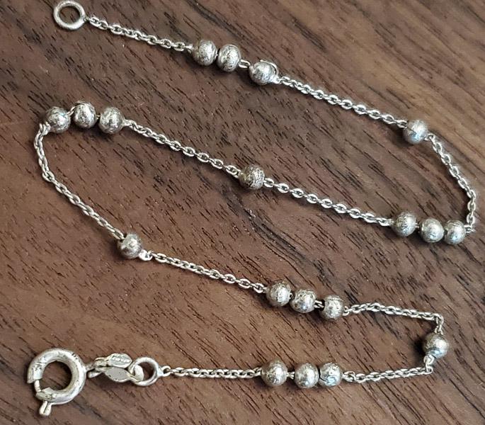 Beaded Sterling Silver Bracelet or Anklet: Please see pics for details as this is the exact item you will receive.Ã‚ Size: 9.25 Inches Measures: 3.2mm wide Weight in Grams: 1.97 Hallmarks & Stamps Include: 925 Please note: All items are