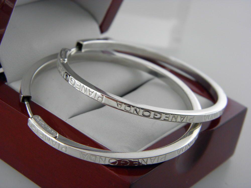 44mm Pianegonda Sterling Silver Hoop Earrings: Have a 44mm drop and are 2.5mm wide. Signed Pianegonda Italy 925 Please note: All items are taken at stamped value and are not tested unless stated. As with many vintage items, p