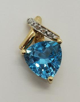 14k Gold 2.61ct Trillion Cut Swiss Blue Topaz Pendant: Pendant has a 17mm drop and is 10.5mm wide. Has 5 round Diamonds cascading from the top of the bail. Please note: All items are taken at stamped value and are not tested unle