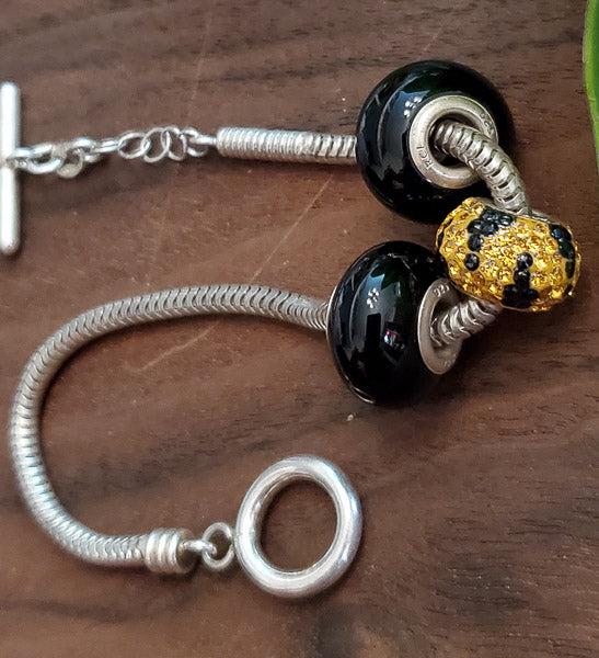 RCI Italy Sterling Silver Bracelet: Length:Ã‚ 7.5 inches Width: 12 and 15 mm Beads Clasp: Toggle Weight in Grams: 15.15 Hallmarks and Stamps:Ã‚ RCI, Italy, 925 Please note: All items are taken at stamped value and are not tested u