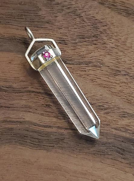 Quartz and Ruby Sterling Silver Pendant: Please see pics for details as this is the exact item you will receive.Ã‚ Measures: 46mm drop and 8.5mm wide Weight in Grams: 5.7 Hallmarks & Stamps Include: 925 Please note: All items are take