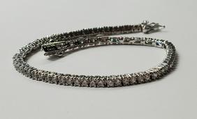 Classic Style Sterling Silver Cz Bracelet: Sterling Silver Cz Tennis BraceletMeasures 7.5 inches long and 2.5 mm wideShipping Time: Usually 2-5