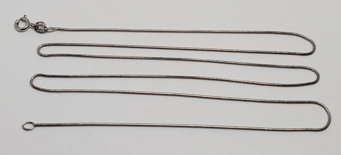 24 Inch Italy Sterling Silver Snake Chain: Please review the pictures in detail as they are a major part of our description. The item pictured is the exact item you will receive.Ã‚ Length: 24 Inches and 1mm wide Weight in Grams: 3.08 Hallma