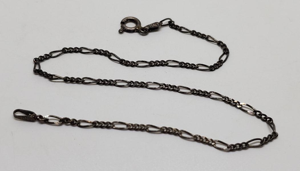 Simple Sterling Silver Link Bracelet or Anklet: Please see pics for details as this is the exact item you will receive.Ã‚ Length: 9 inches and 2mm wideÃ‚ Weight in Grams: 1.63 Hallmarks and Stamps: 925, Italy Due to the limited amounts of cle