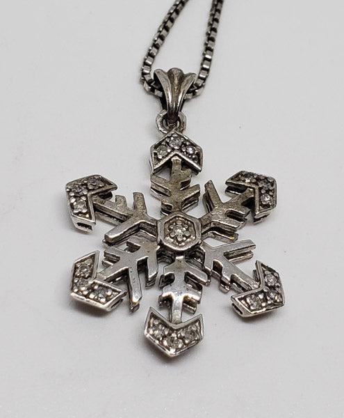 HAN Snowflake Sterling Silver Necklace: Please review the pictures in detail as they are a major part of our description. The item pictured is the exact item you will receive.Ã‚ Length: 18.5 Inches, Pendant has a 28mm drop and is 18mm wi
