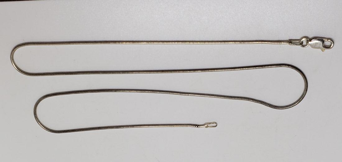 Classic Italy Sterling Silver Snake Chain: Please review the pictures in detail as they are a major part of our description. The item pictured is the exact item you will receive.Ã‚ Length: 18 Inches Weight in Grams: 5.0 Hallmarks and Stamps