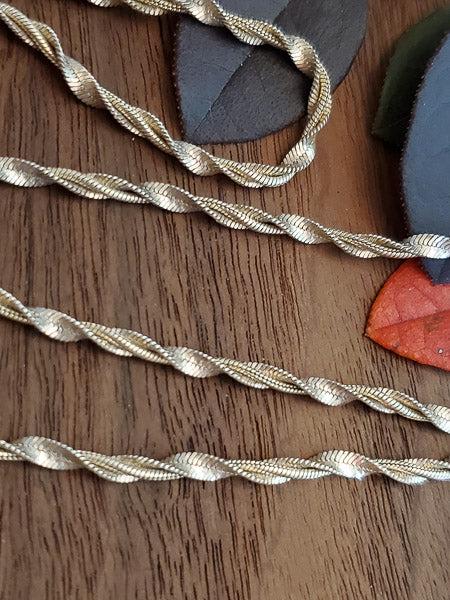 Sterling Twisted Herringbone and Snake Chain Necklace: Ã‚ Please see the pictures for full details as this is the exact item you will receive.Ã‚ Length: 18 Inches