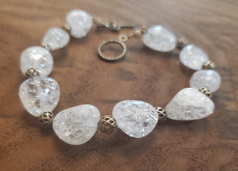 Crackled Quartz Bracelet: Please see pics for details as this is the exact item you will receive.Ã‚ Length: 9.5 inches Width: Appx 14 to 15mm beads Hallmarks and Stamps: N/A, Metal not testedÃ‚ Due to the limited amounts