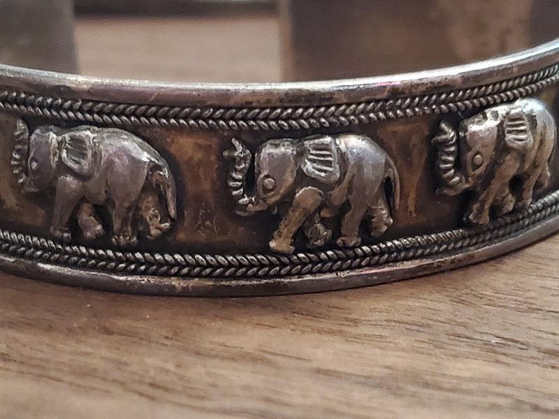 Elephant Sterling Silver Cuff Bracelet: Length:Ã‚ 2.4 inches inside diameter and is 16.8mm wideÃ‚ Weight in Grams: 34.75 Hallmarks and Stamps: 925 and tested sterling Please note: All items are taken at stamped value and are not teste