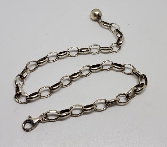 Rolo Style Sterling Silver Bracelet or Anklet: Please see pics for details as this is the exact item you will receive.Ã‚ Length: 8.75 inches, 5mm wide Weight in Grams: 6.35 Hallmarks and Stamps: 925 Due to the limited amounts of cleaning and po