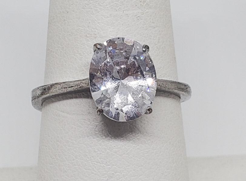 Silver Simple Oval Solitaire Ring sz 8: Please see pics for details as this is the exact item you will receive. Size: 8 Item Details: 10mm by 8mm center Weight in Grams: 2.66 Hallmarks & Stamps Include: FJ and ring was not tested for me