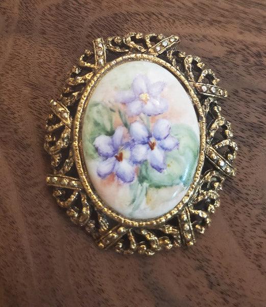 A. E. Harter Signed Porcelain Brooch: Please see the pictures for exact details as this is the item you will receive.Ã‚ Measurements: Has a 2.3 inch drop and is 2 inches wide Hallmarks and Stamps: A. E. Harter Other: Metal is gold tone