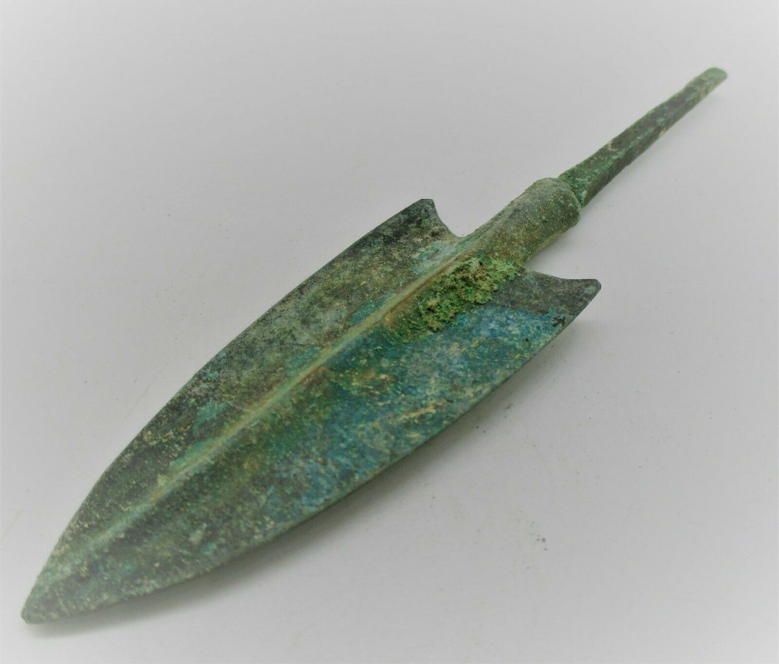 1500+- BCE ANCIENT BRONZE LONGSHOT BARBED ARROWHEAD (1 of 2)
