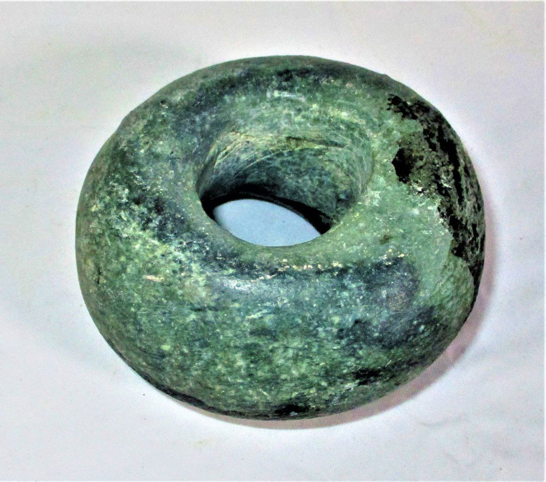 6000 – 5500 BCE Archaic Period Middle Holocene Stone: 6000 to 5500 BCE Archaic Period Middle Holocene Donut Stone, Very Rare Archaic Period, Middle Holocene Newport Perforated Stone, Talisman These large ritual bifaces indicate late Earl