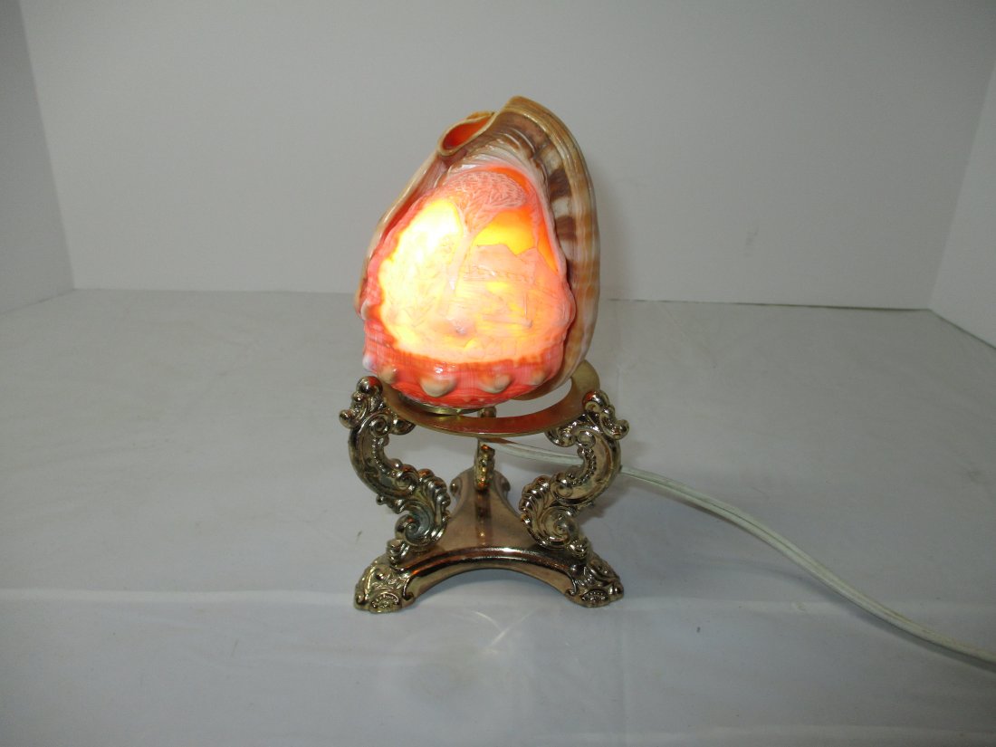1930+ Carved Cameo Shell Seascape Volcano, Steam Ship: 1930+ Vintage Carved Cameo Shell Seascape Volcano, Steam Ship Lamp, Night Light Vintage carved cameo shell accent lamp. The beautiful intricate carving of a steamship going along a coastline. There is