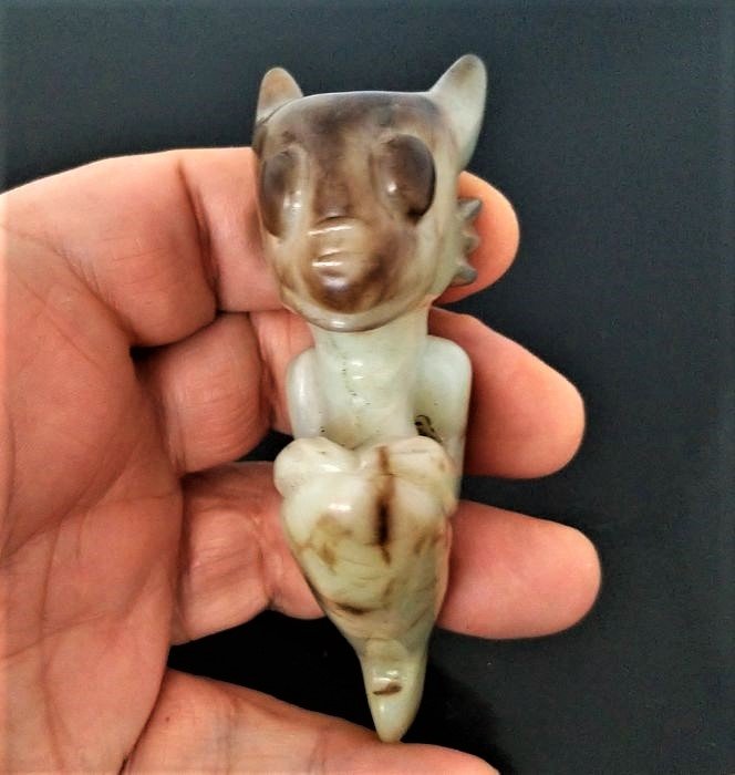 3500 2300 BC Amulet, Totemics,Insane Sun God Sculpture: 3500-2300 BC Large Amulet, Totemics, Insane Sun God Sculpture Hongshan Culture Style Wall erected against evil spells and repels evil. Large carved amulet - Totemic - Alienated sculpture of the 