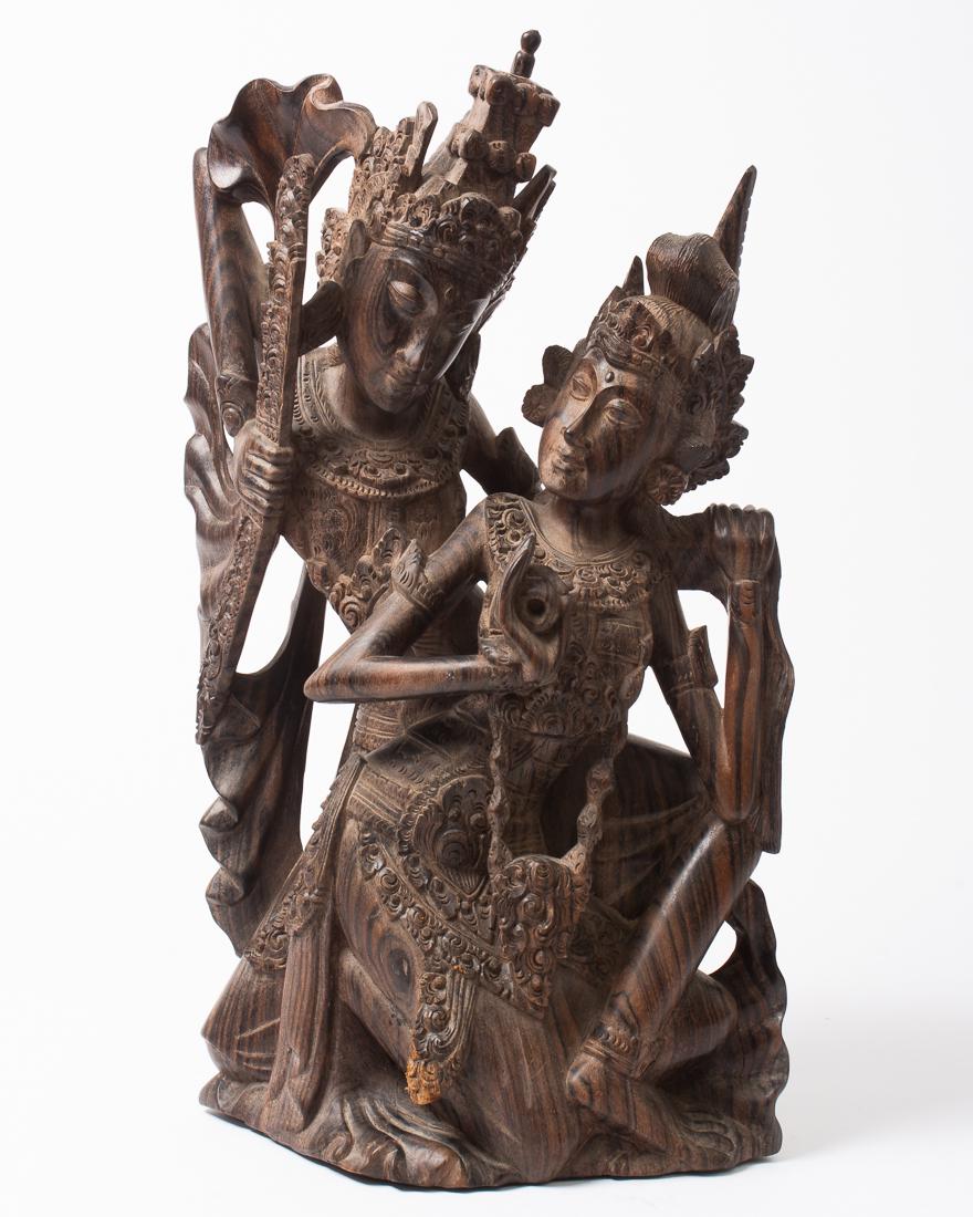 Vintage Carved Rosewood Hindu Statue of Man & Woman 17": Description: Vintage carved rosewood statue of a crowned man and woman from Southeast Asia / Indonesia. Beautiful carved wood with incised detailing. Dimensions: 17.