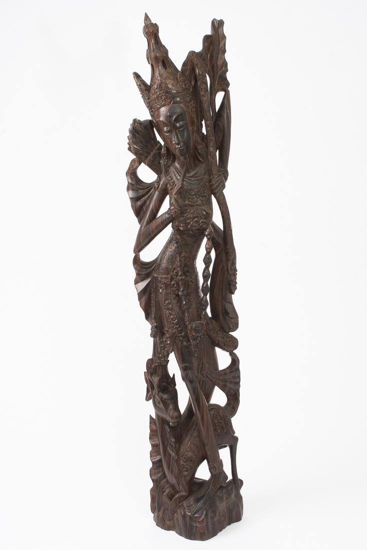 Large Southeast Asia Rosewood Statue Lord Rama 42"tall: Description: Large rosewood statue carving depiction of the Hindu god Rama on the hunt with bow, quiver and deer. Beautiful carved wood with elaborate detailing. Dimensions:<