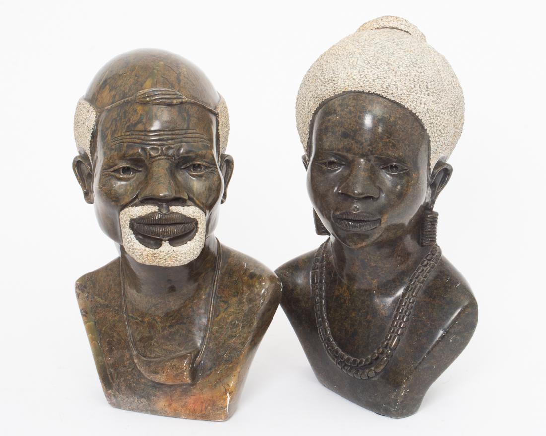 Stone Sculpture Busts Victor Mutongwizo, Zimbabwe 14"t.: Description: A pair of carved marble busts of an African man and an African woman by Zimbabwe Artist Victor Mutongwizo. Both are expertly carved and detailed. Dimensions:
