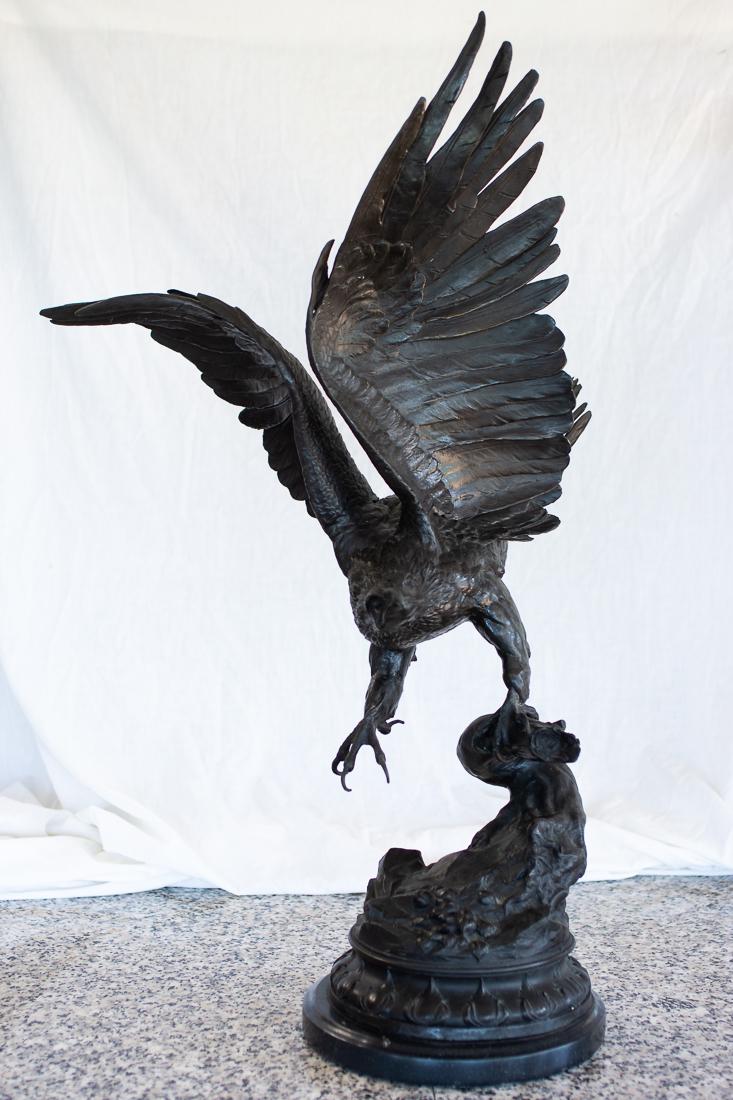 "Eagle" Bronze Sculpture Statue by Jules Moigniez 34"t.: "Eagle" Lost Wax Bronze Sculpture Statue by Jules Moigniez Original bronze of an eagle with an open talon and spread wings taking off from a branch. Dimensions: 33.5" tall x 20.5" wide on a 10" pedest