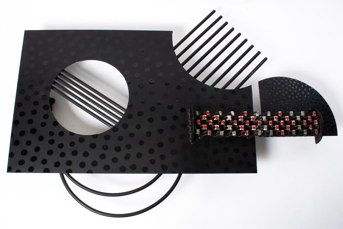 Brother Mel Meyer Stainless Steel Guitar Sculpture 36": Description: Original metal artwork by artist Brother Mel Meyer depicting an abstract stainless steel guitar with welded loops for hanging. Signed by the artist. Measurements: 26" tall x 36" long