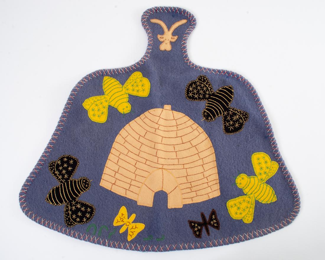 Hand Sewn Baker Lake Tapestry Wall Hanging Igloo Tigisi: Vintage Native Inuit Eskimo Hand Sewn Tapestry Wall Hanging Depiction of an Igloo, Moths / Bees and signed in SyllabicsA piece from Baker Lake, marked with what appears to be: Tigisi nuluDim