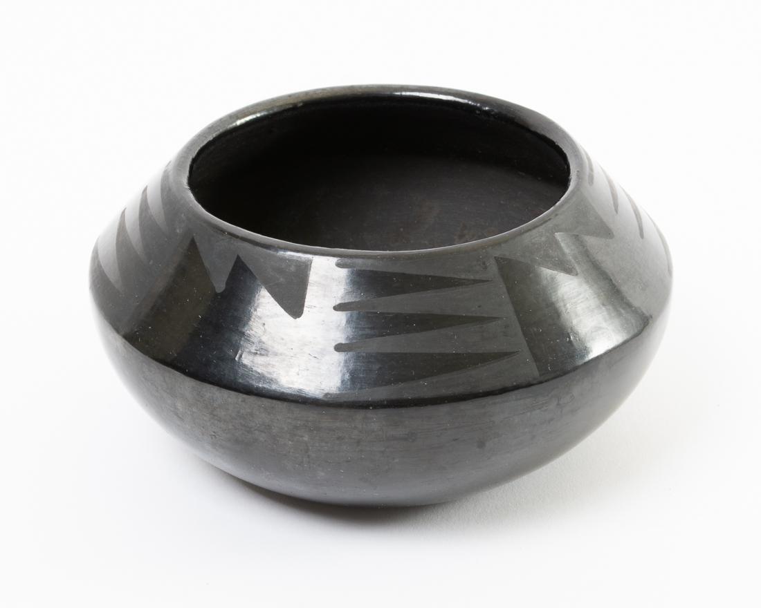Maria Martinez Black Pottery Bowl San Ildefonso Pueblo: Signed Maria Martinez Black-on-Black Pottery BowlSan Ildefonso Pueblo / Native American Ceramic Dimensions: 2.5" Tall x 5.5" Wide