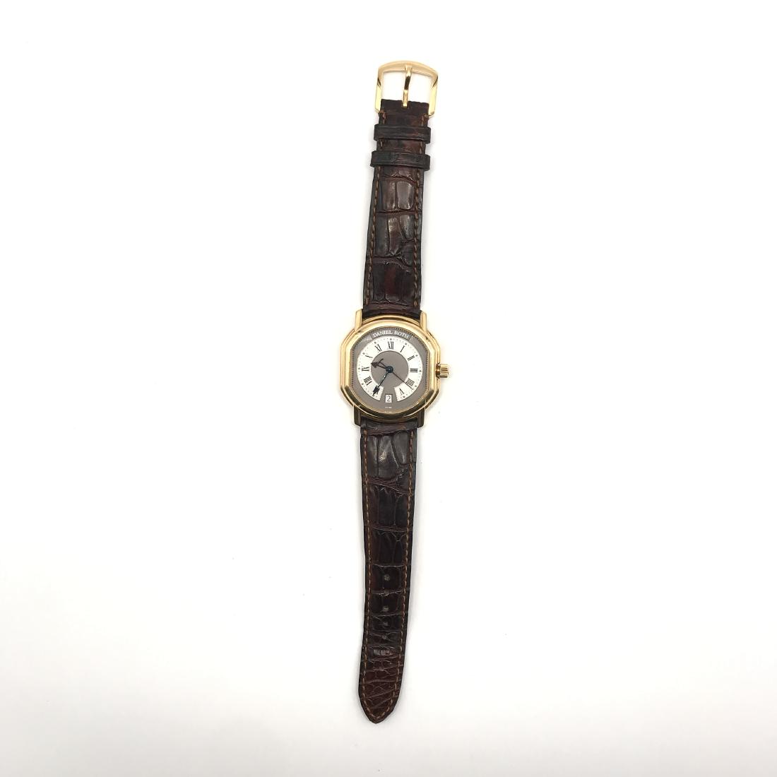 Daniel Roth: orologio in oro 18kt cassa tonneu, quadrante bitonale con numeri romani in smalto nero, data al sei, secondi al centro, fondello scheletrato a vista, movimento a carica automatica, con scatola e garan