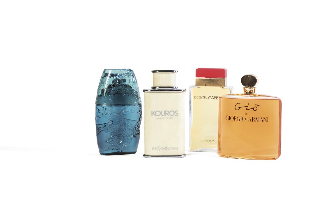 Guy Laroche, Yves Saint Laurent, Dolce & Gabbana e: lotto di profumi composto da quattro grandi bottiglie di diverse dimensioni