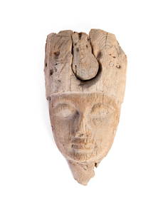 Antica maschera egizia in legno altezza cm 25,5,: Antica maschera egizia in legno altezza cm 25,5, difetti e mancanze Il lotto è stato segnalato alla Soprintendenza per i Beni Archeologici di Roma. The sculpure is dated Tolemaic period (VII-I B.C.)1