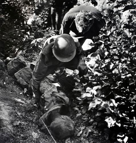 Robert Capa (1913 - 1954) Wounded soldier, Italy,: Robert Capa (1913 - 1954) Wounded soldier, Italy, 1943Gelatin silver print, printed ca. 1950. Photographer's and Magnum Photo credit stamp on the verso. cm 35 x 28 (13.8 x 11 in.)(1)