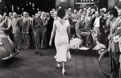 Mario De Biasi (b. 1923) Gli italiani si voltano,: Mario De Biasi (b. 1923) Gli italiani si voltano, Milano 1954Gelatin silver print, printed ca. 1980. Signed, titled and dated in pencil on the verso. cm 24,5 x 37,8