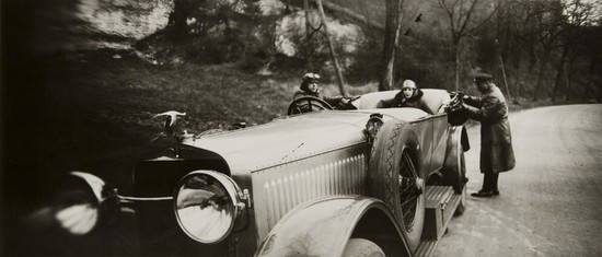 Jacques-Henri Lartigue (1894-1986) La Route d'Houl: Jacques-Henri Lartigue (1894-1986) La Route d'Houlgate, Bibi with Mamie and the Chauffer, Jean, in her Hispano Suiza 32 HP, 1927Gelatin silver print, printed ca. 1970. Signed, titled and dated