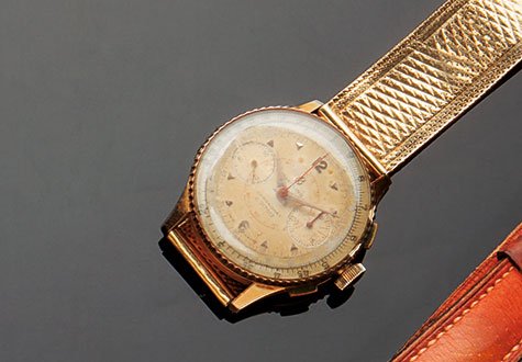Orologio cronografo Breitling, Chronomat: anni Cinquanta, in oro giallo 18kt, due contatori, ghiera girevole, lancetta del crono rossa, bracciale in oro giallo 18 kt, cassa mm. 35A Breitling cronograph, Chronomat, made in 50’s, yellow gold 