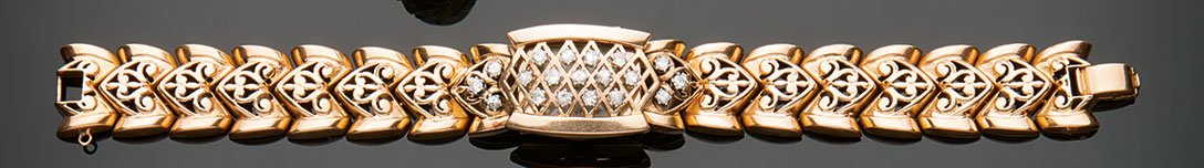 Bracciale orologio Eska: in oro giallo 18 kt con piccoli brillanti, manifattura degli anni Trenta. Lunghezza cm. 18. Gr. 48Bracelet and wristwatch by Eska, 18 kt yellow gold with small brilliant cut diamonds, 30’s, 18 cm lo