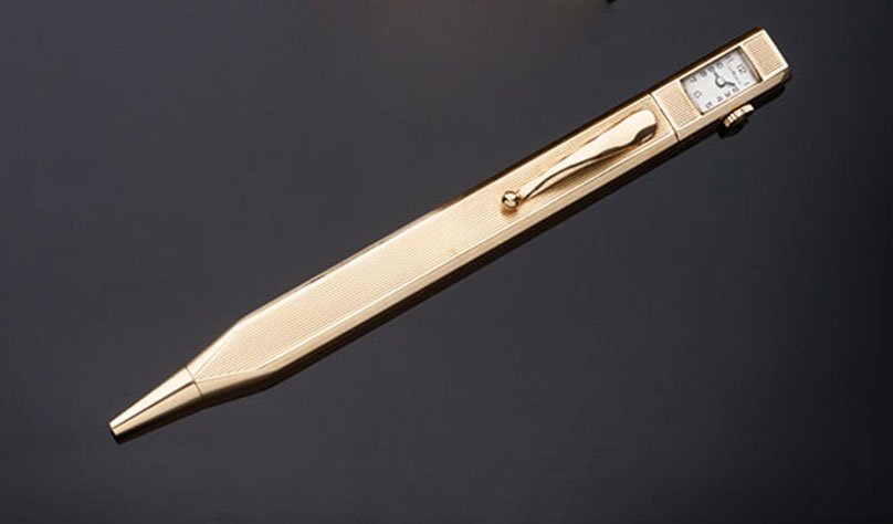 Matita orologio, Cartier: in oro giallo 14 kt, realizzata negli anni Trenta, con orologio movimento a carica manuale, di forma rettangolare, lancette in acciaio azzurato, quadrante a smalto. Lunghezza cm. 13. Gr. 35.00A 14 kt 