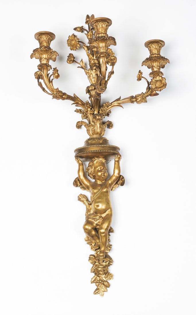 Due applique con putti reggicandela in bronzo dorato    (1 of 2)