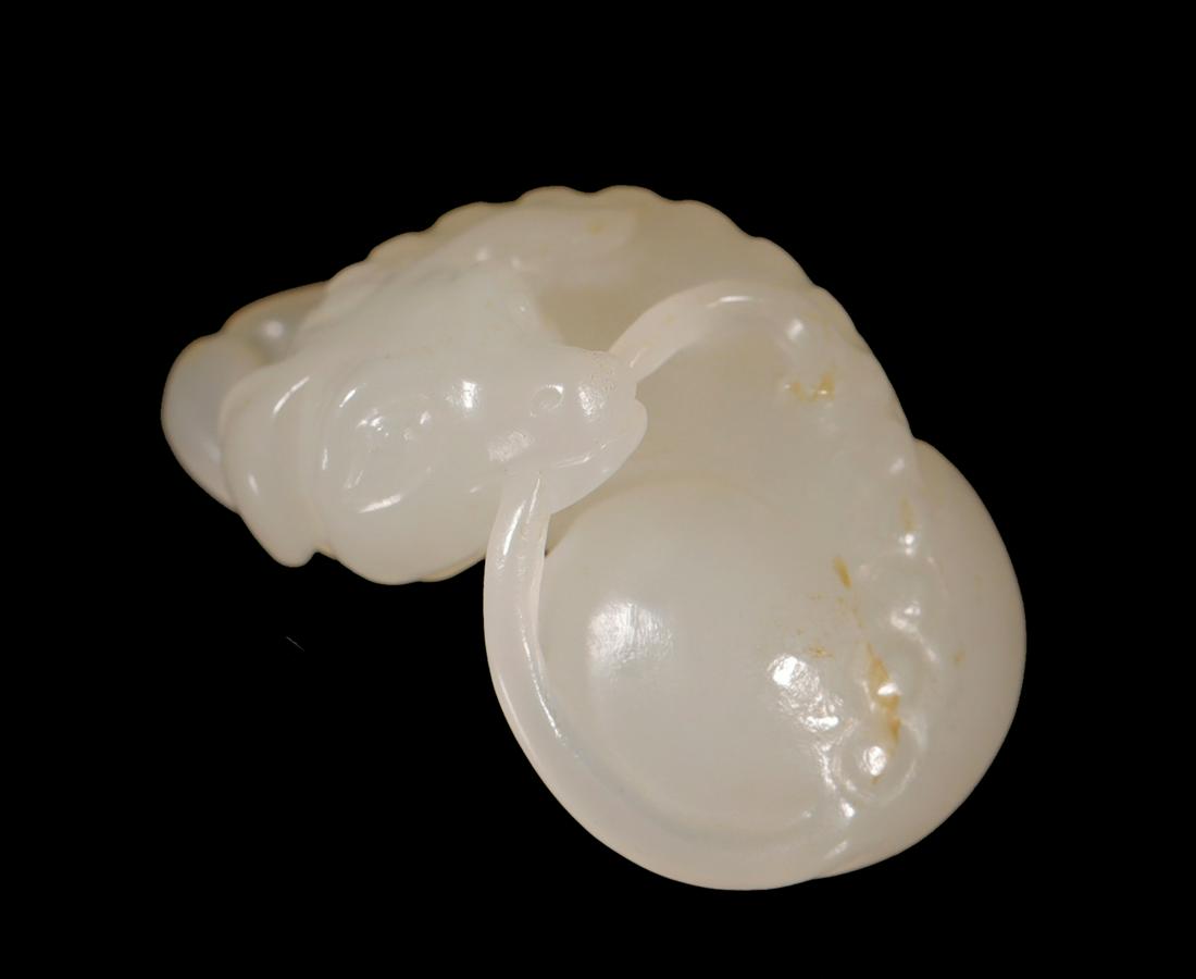 Qing Dynasty - Carved Hetian Jade Dog: H: 5/8 in(1.5cm) L: 1 1/8 in(2.9cm) Wt:8.8g