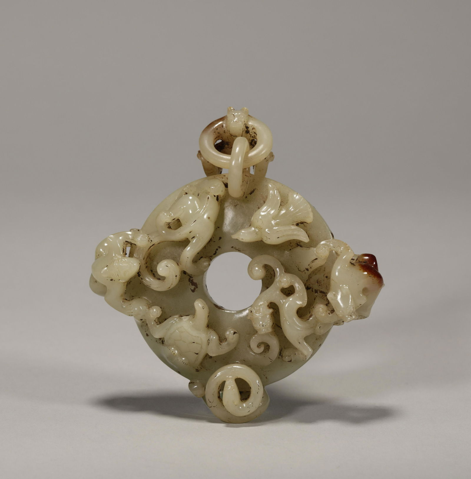 Han Dynasty Hetian jade running beast bi (1 of 7)