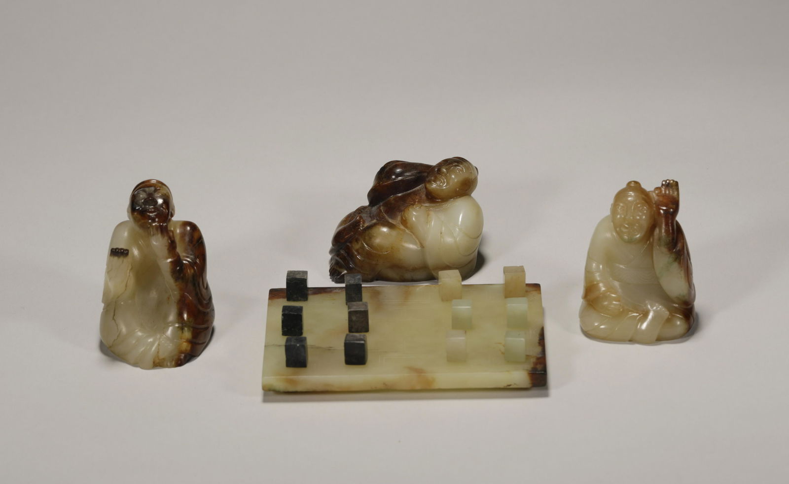 A group of Han Dynasty chess figurines (1 of 9)