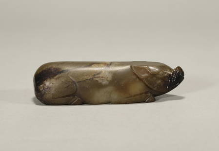 Jade pig of the Han Dynasty: L: 4 1/2 in(11.5cm) W: 1 3/8 in(3.5cm) wt:218g