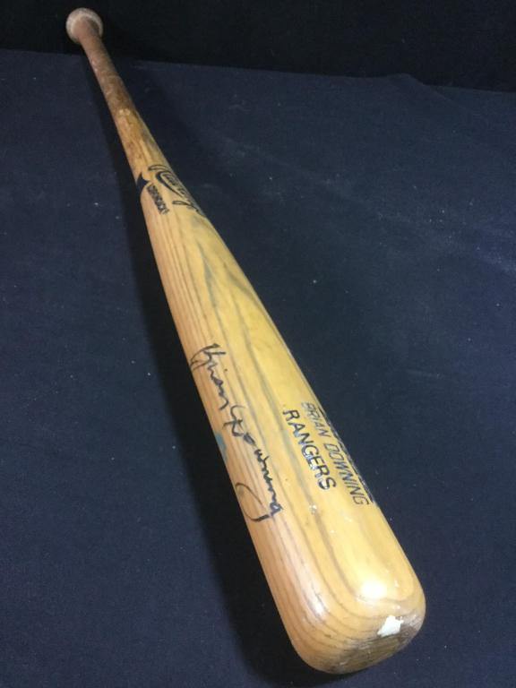 Autograph Bat: Brian Downing from the Rangers, Authentic. Bat measures 35" and is in good condition. There is a split on top from use. .