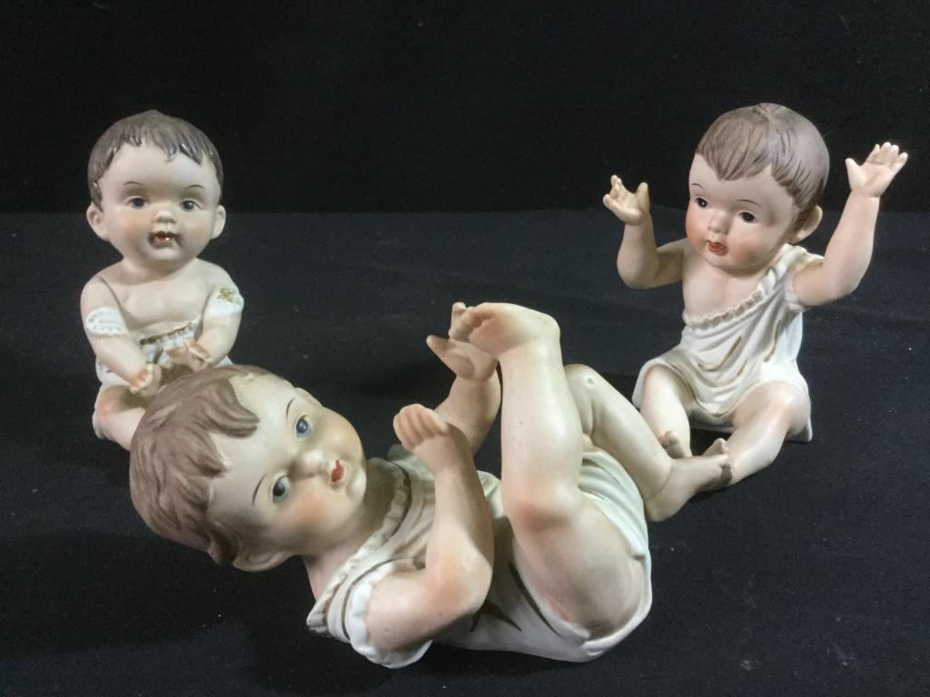 Vintage Gerbruder Heubach Piano Babies: Total of 3 in this lot. No chips or cracks in great condition. Measures 4 1/4" to 5".