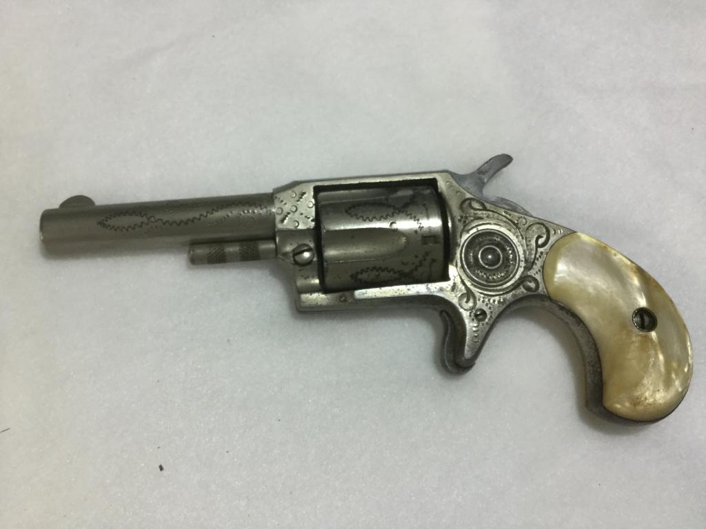 Vintage Red Jacket 32 Caliber: Antique Lee Arms Co. Red Jacket No. 3 Revolver. 32 cal., spur rim fire revolver. Etched with mother of pearl handle 1 5/8 inch barrel.