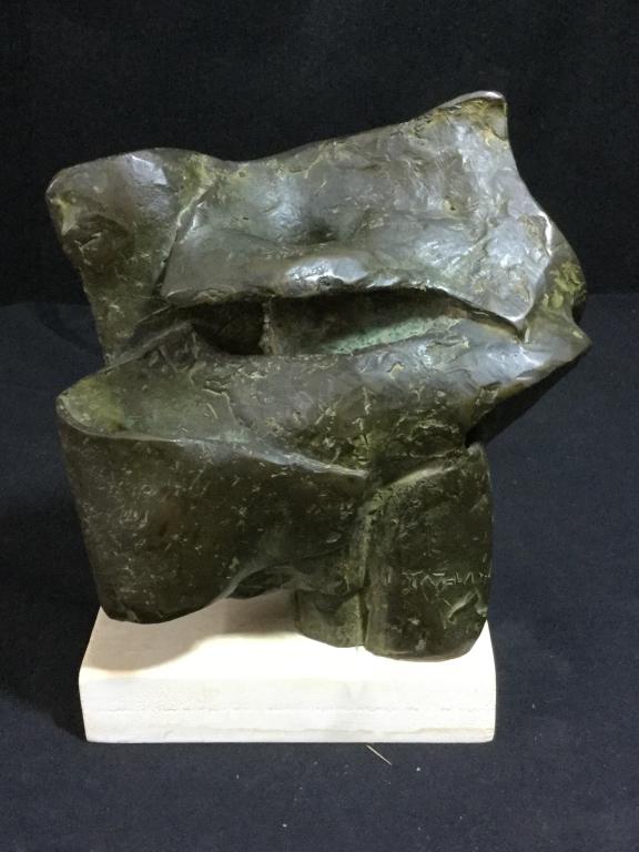 Bronze Statue: Neat art deco bronze that measures 7 1/42h. With base measures 8 1/4". Signed on front of piece "Tazian". In good condition and a nice piece. Value 150.00-250.00