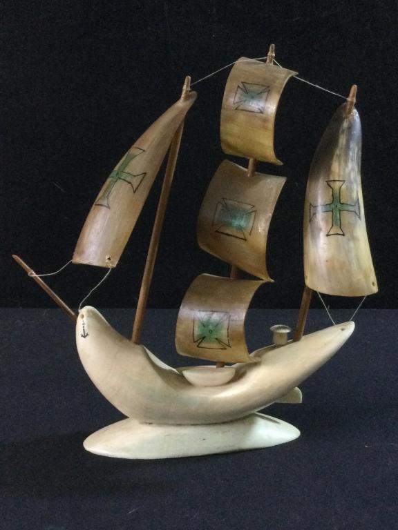 Carved Ship Sperm Whale tooth & Horn: Unique piece that measures 9 1/4"h x 9"l. Signed on bottom from New Bedford, MASS. The horn sails are painted and there is also a anchors painted on the whale tooth ship. There is also a articulating 