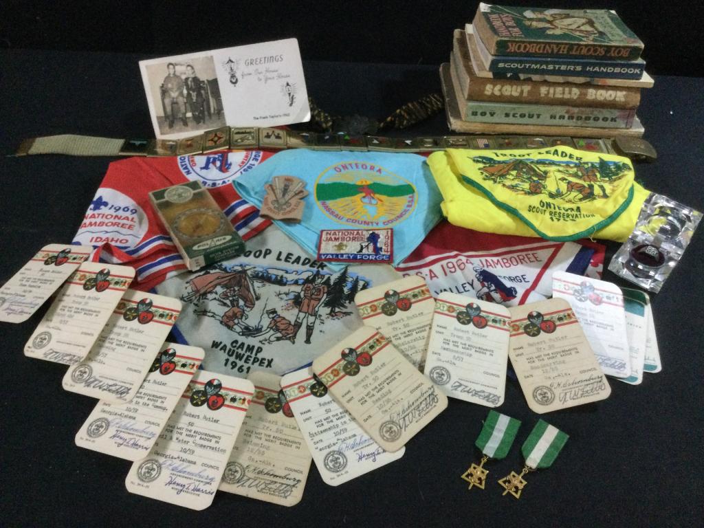 Vintage Boy Scout: Huge lot of BS memorabilia. There is (6) hand books, ring, belts, post card (1962), patch, (5) flags, BS merit cards for badges, metals, etc.